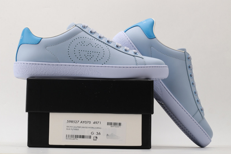 G*u*i sneakers