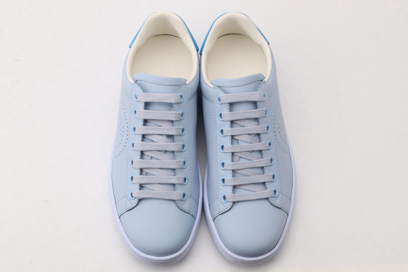 G*u*i sneakers