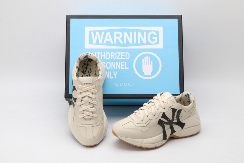 G*u*i sneakers