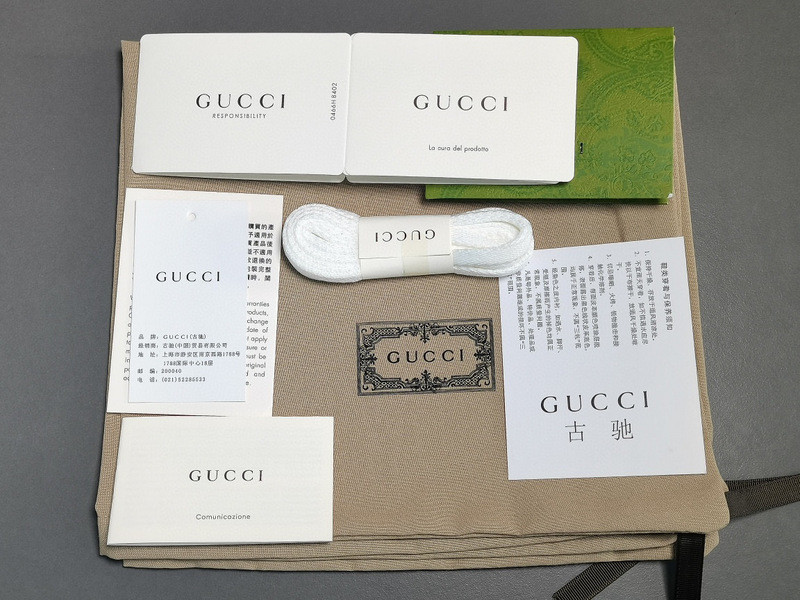 G*u*i sneakers