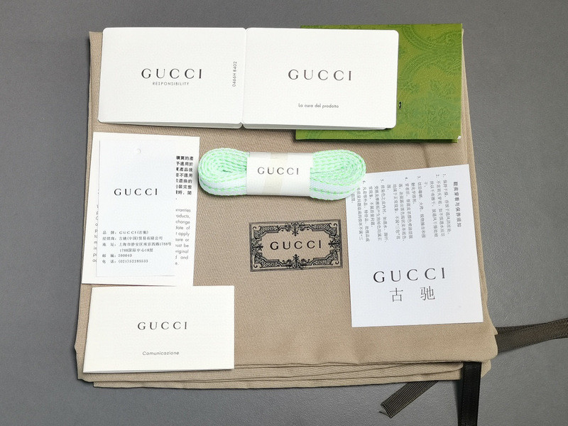 G*u*i sneakers