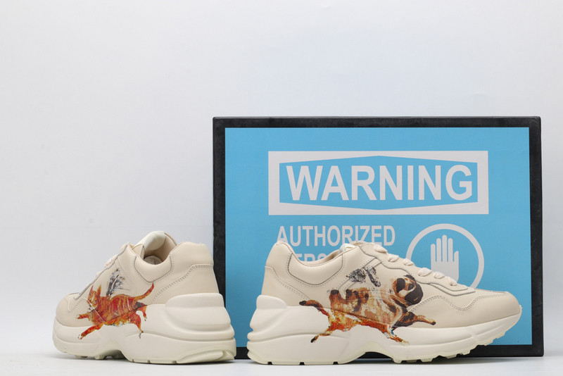 G*u*i sneakers