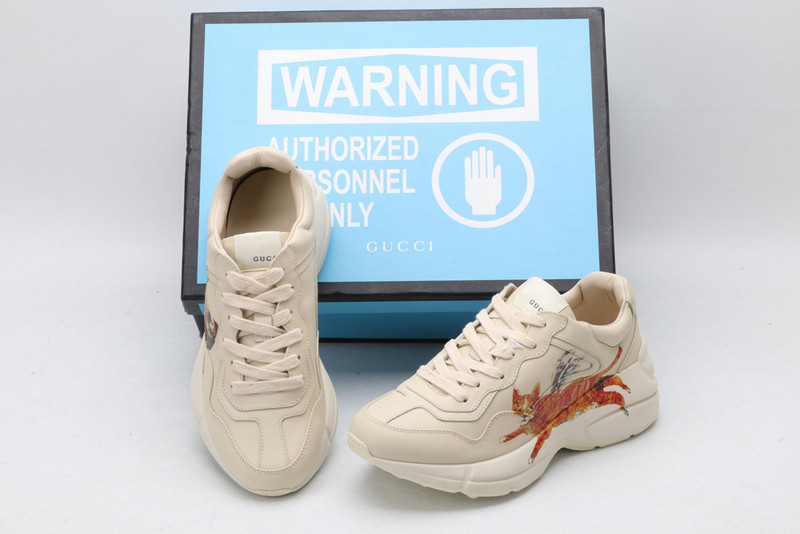 G*u*i sneakers