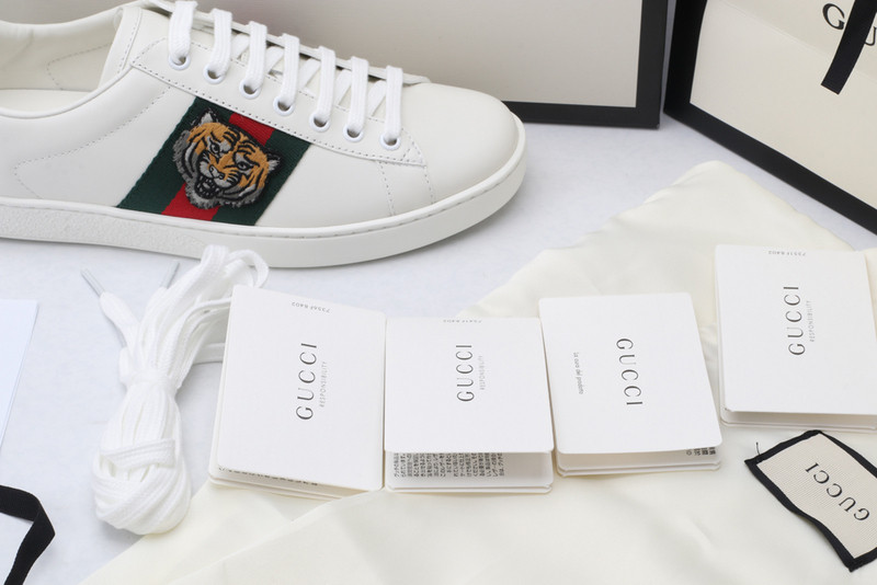 G*u*i sneakers