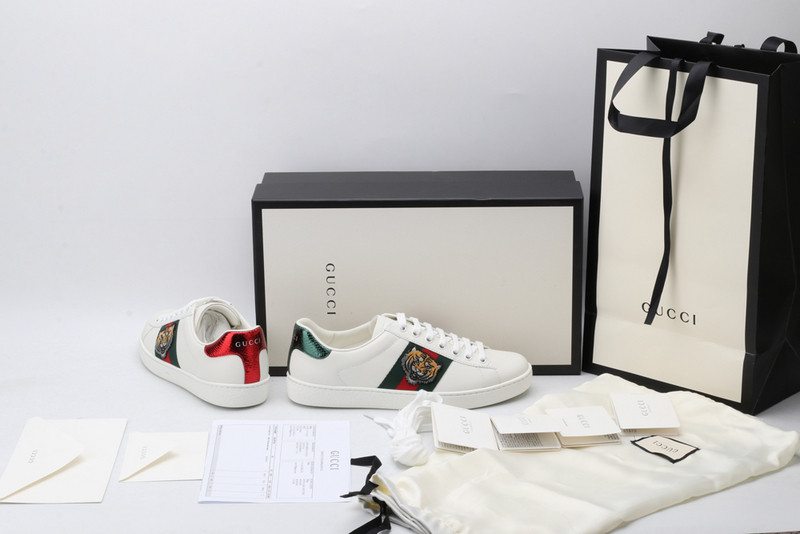 G*u*i sneakers