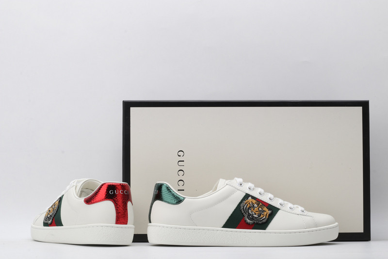 G*u*i sneakers