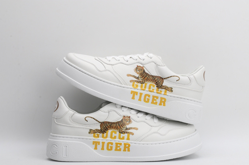 G*u*i sneakers