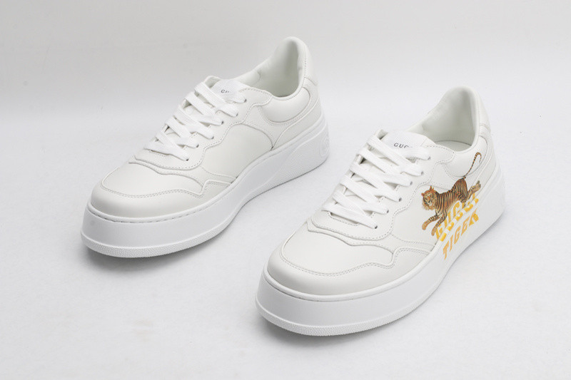 G*u*i sneakers