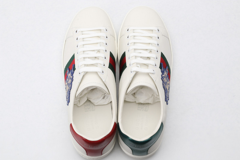 G*u*i sneakers
