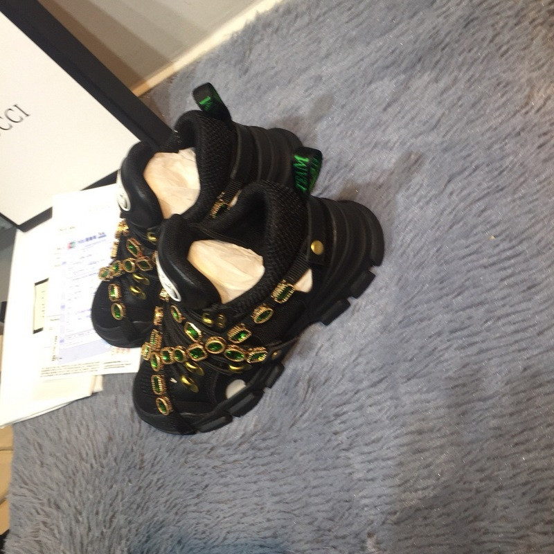 G*u*i sneakers