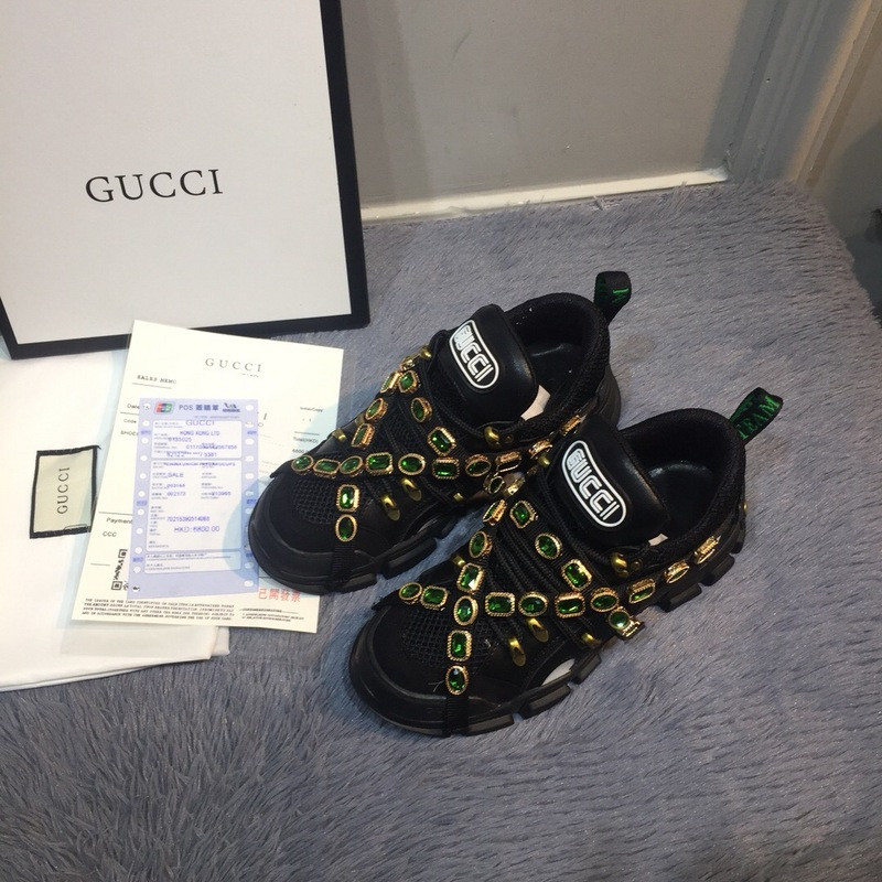 G*u*i sneakers