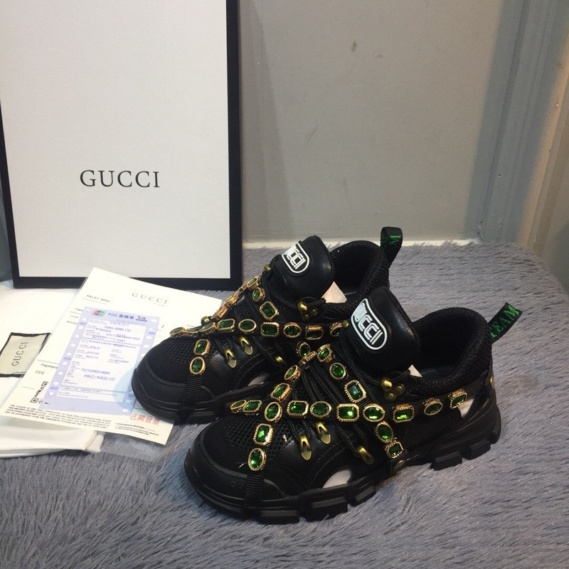 G*u*i sneakers