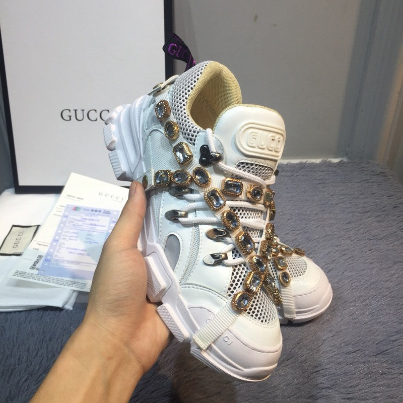 G*u*i sneakers