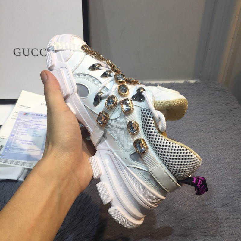 G*u*i sneakers