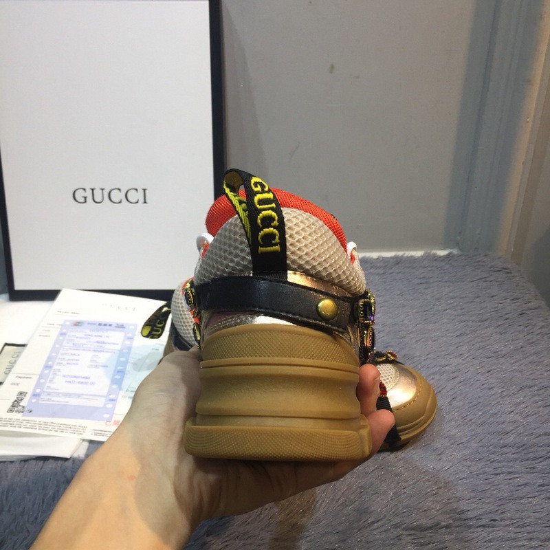G*u*i sneakers