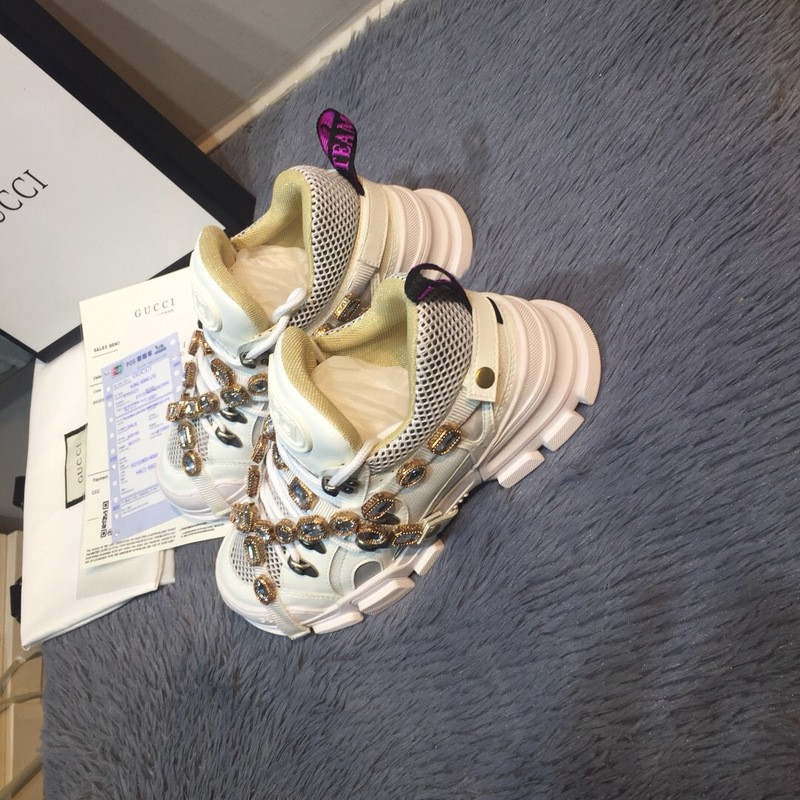 G*u*i sneakers