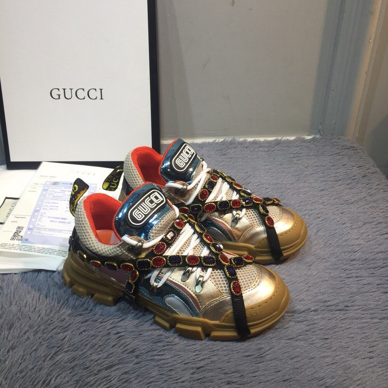 G*u*i sneakers