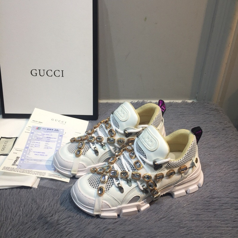 G*u*i sneakers
