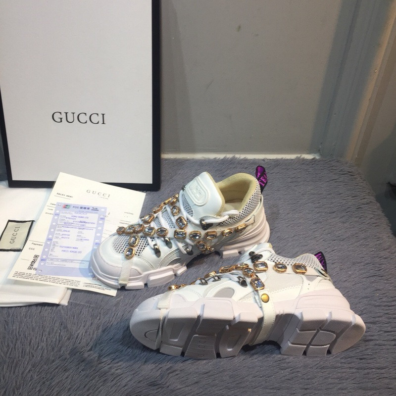 G*u*i sneakers
