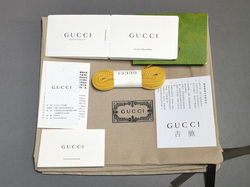 G*u*i sneakers