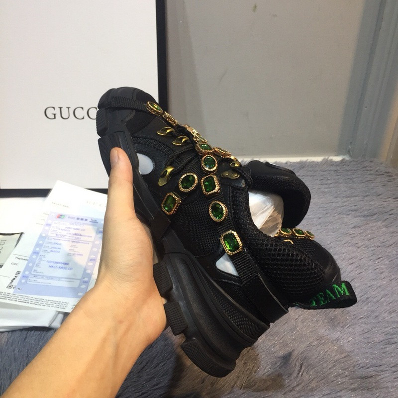 G*u*i sneakers