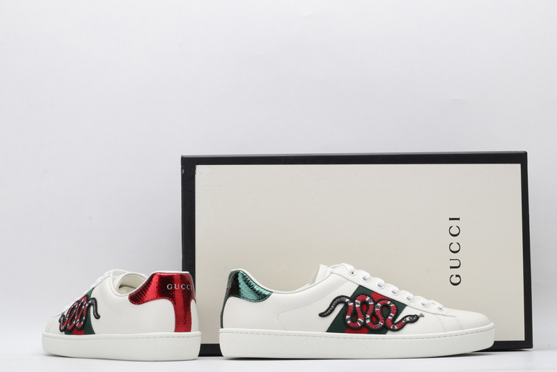 G*u*i sneakers