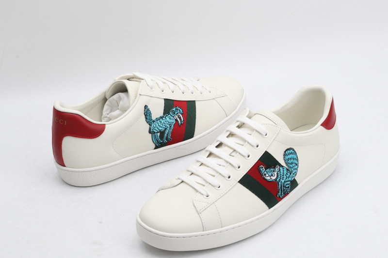 G*u*i sneakers