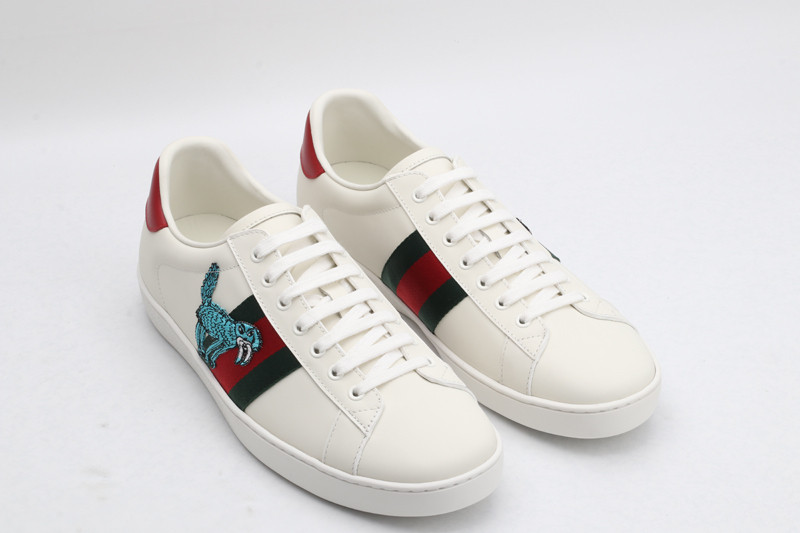 G*u*i sneakers