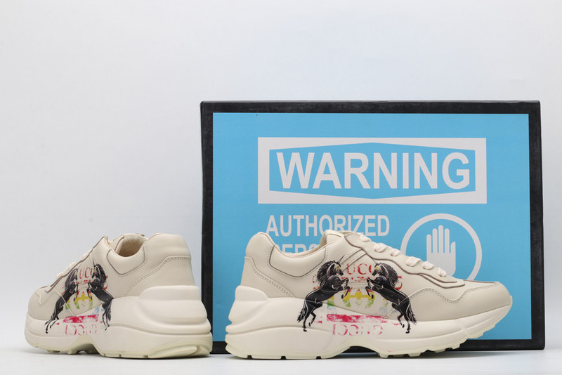 G*u*i sneakers