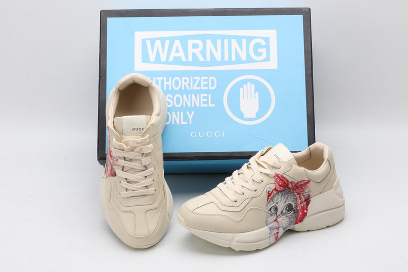 G*u*i sneakers