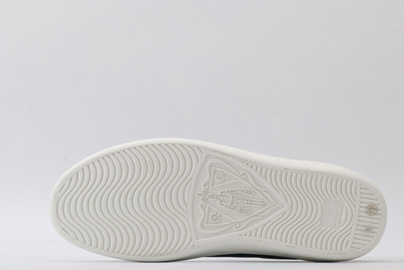 G*u*i sneakers
