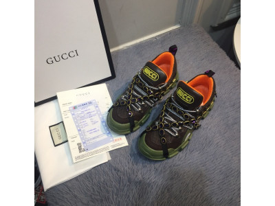 G*u*i sneakers