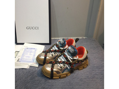 G*u*i sneakers